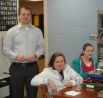 Rotarian Nick Kruthaupt distributes Interact pins